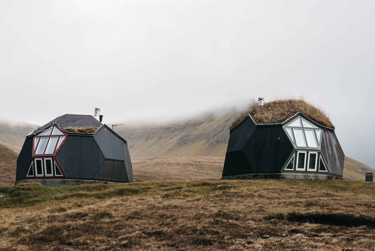 glamping huts in the fog