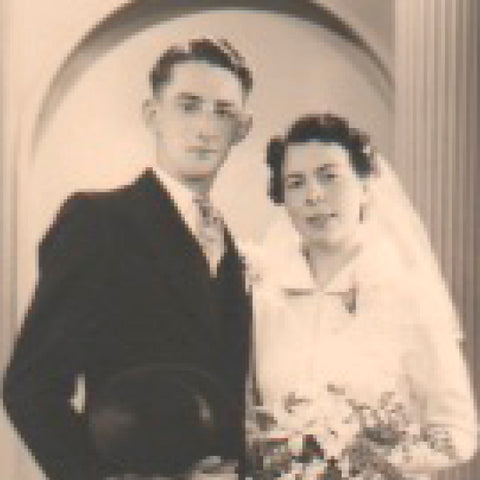 A blurry enlargement of a high-quality formal wedding portrait that was scanned at low quality.