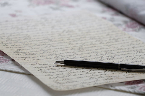 A close-up of a handwritten letter, showing the details of the pen and the individual strokes.