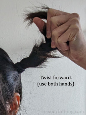 Twist the hair to form into a bun.