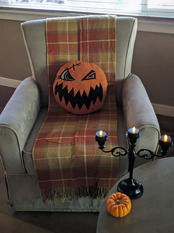 KH Pumpkin Mask Pillow On Chair