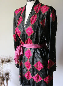 Black silk sari jacket with hot pink panels and metal thread