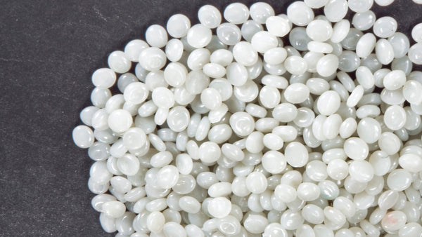 Image: A closup of HDPE Pellets that are used to Create the Sheet material that Loll produces furniture from.