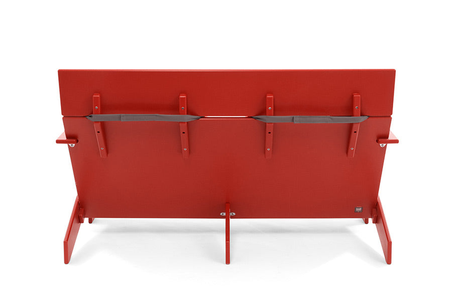 back of red lollygagger outdoor sofa with cushion strapped on