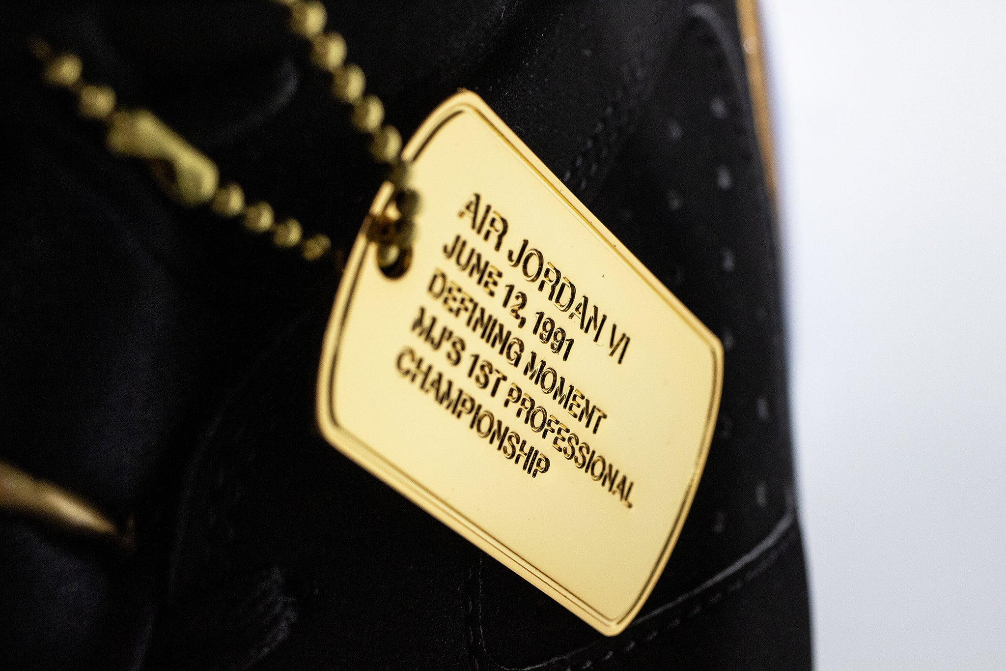 Gold dog tag with defining moments write up