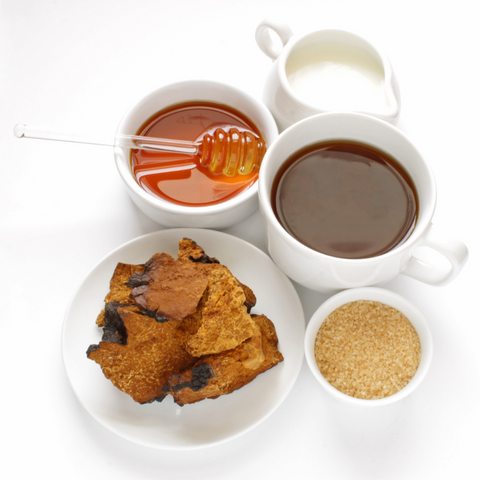 Chaga, honey, and other fixings for making a cup of mushroom tea