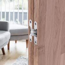 Bisagra oculta para puerta de madera