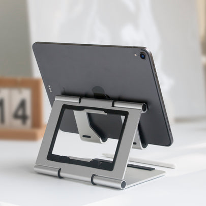 portable stand for iPad on white desktop bright background 