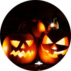 Lit Halloween Jack-o-Lanterns on Dark Background