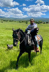 Omar helping yak calf