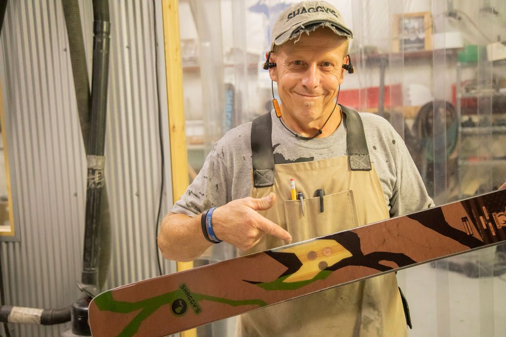 John holding his new custom skis - Custom skis made for the Midwest