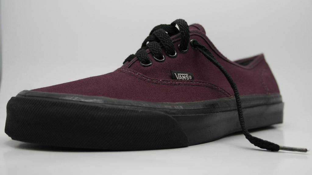 burgundy vans black sole