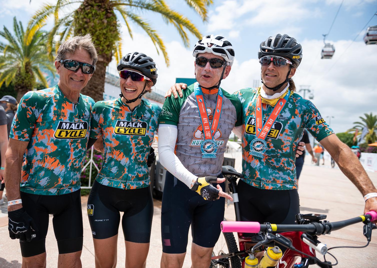 the Mack Cycle Family alongside Dr. Stephen Nimer at the finish line of DCC XI