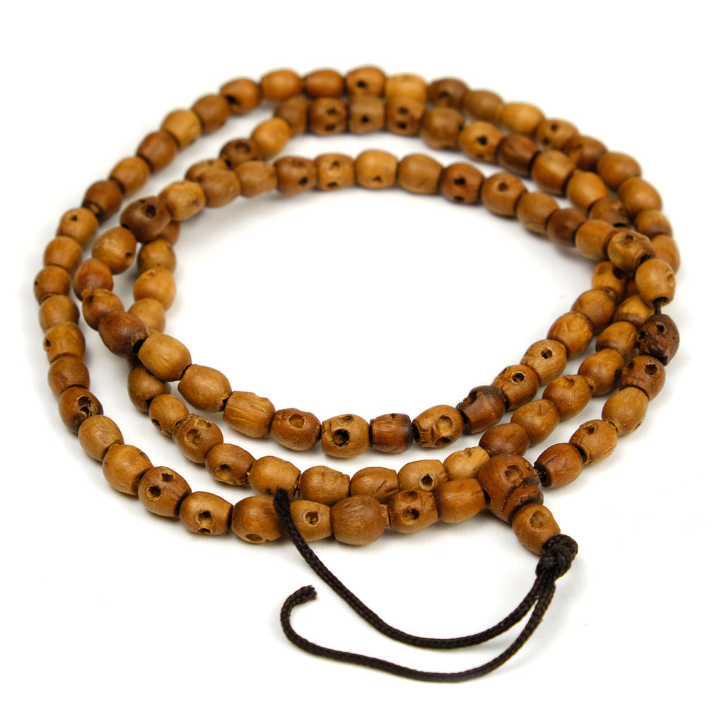 beads bone 108 carved bone mala 7x9mm skull beads.