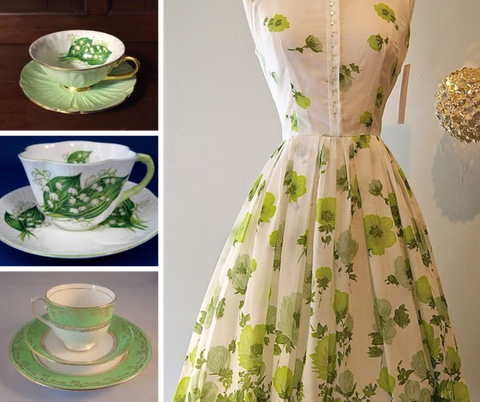 White dress with green leaves on the right and 3 different teacups on the left.  All the teacups have a green and white theme