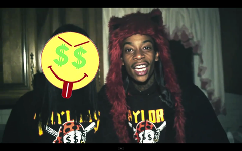 MUSIC VIDEO IMAGE: WIZ KHALIFA “TAYLOR GANG” FEATURING CHEVY WOODS WEARING A FIRE WOLF SPIRITHOOD