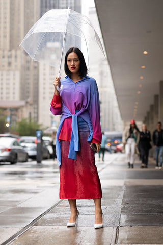 Woman with midi skirt and layered look