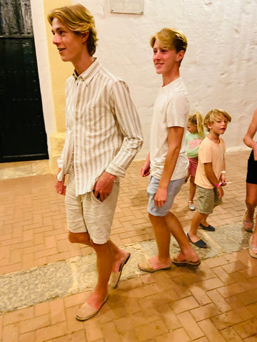 teenage boys in Menorcan sandals