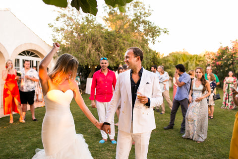 couple celebrating at a wedding.