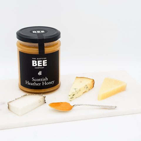 selection of cheeses and honey 