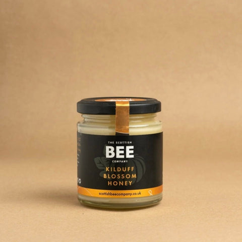 Kilduff Blossom Honey jar with a brown background
