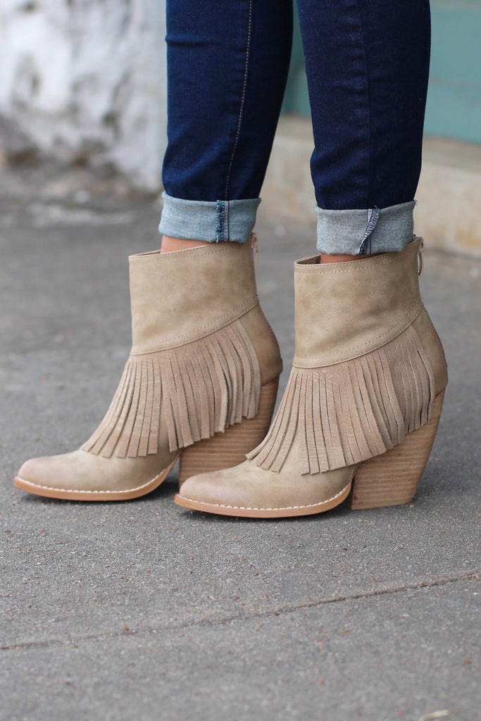 very volatile fringe boots