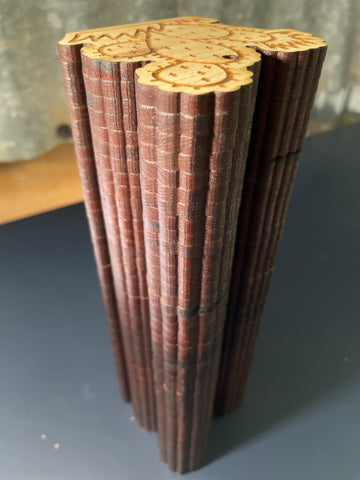 Large stack of laser cut prickly pear cactus ornaments