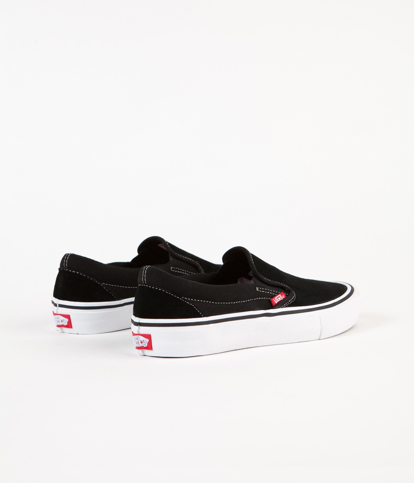 vans slip on pro black white white