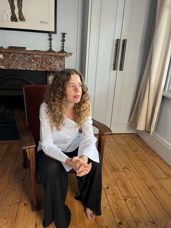 BIANCA SPENDER SITTING IN HER LIVING ROOM IN HER BRONTE HOME