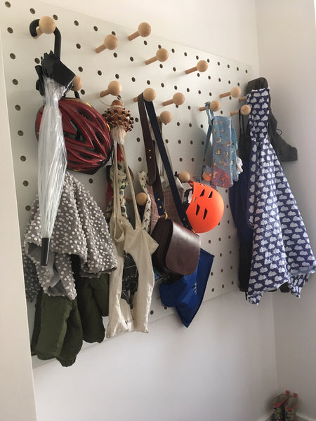 Hallway wardrobe pegboard by Kreisdesign