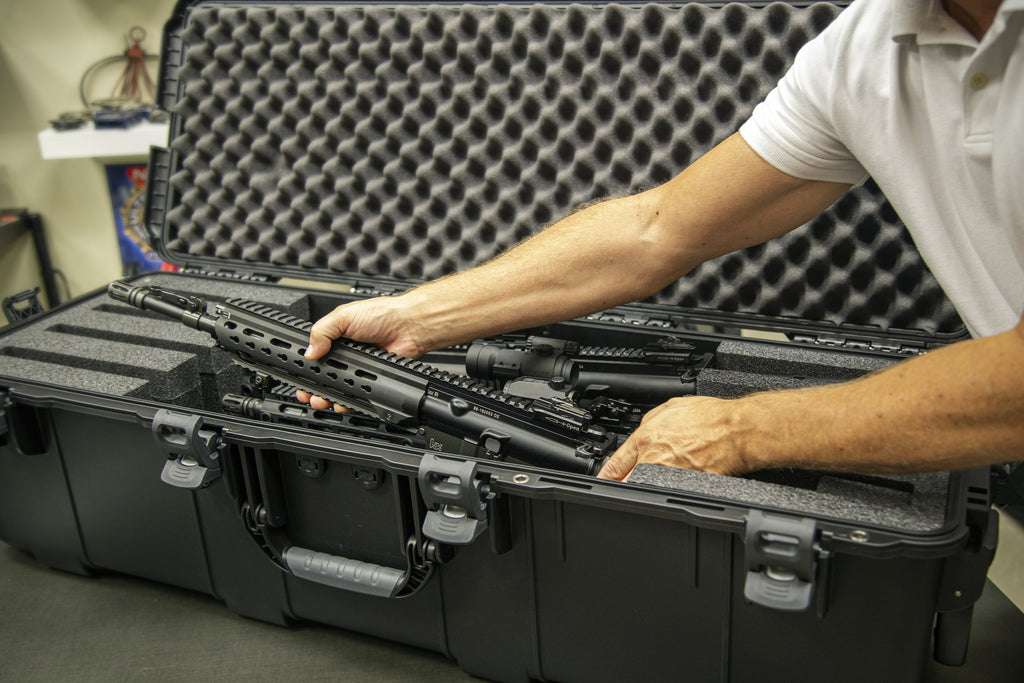 The center cavities allow storage of up to twelve (12) magazines and two (2) NANUK reusable desiccant containers that actively remove moisture inside of the case.