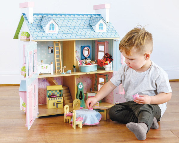 Owner of famous 'Baby Doll' house enjoys play and company at