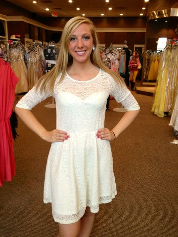 Looking For A White Graduation Dress? RaeLynn’s Boutique has many in s