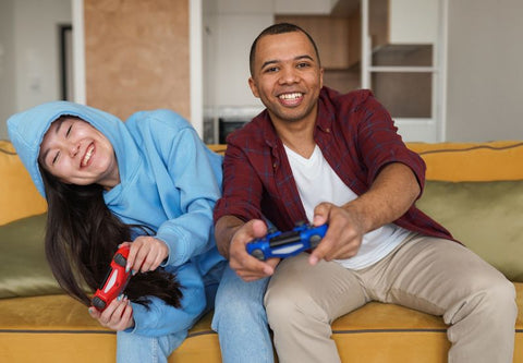 a couple playing on playstation