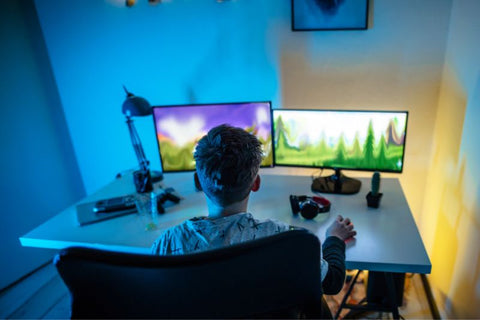 Child playing on his new gaming PC with indirect lighting