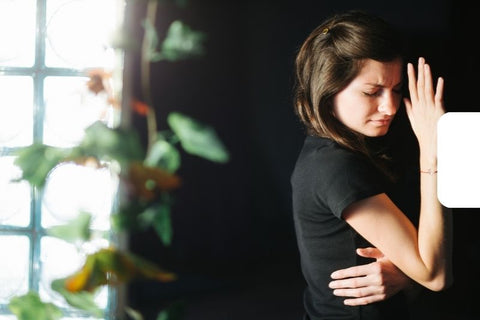 caucasian woman turning away from light