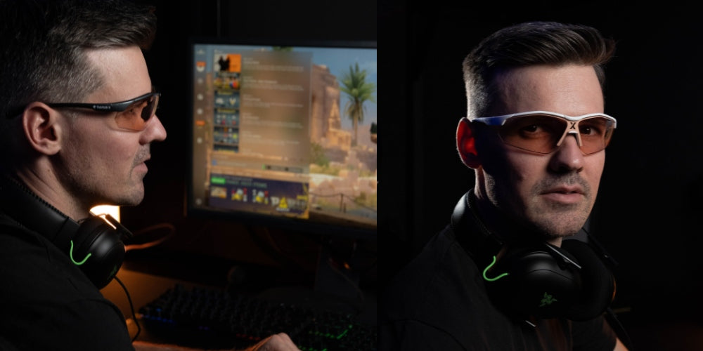a man wearing Horus X anti-blue light glasses while playing on a computer