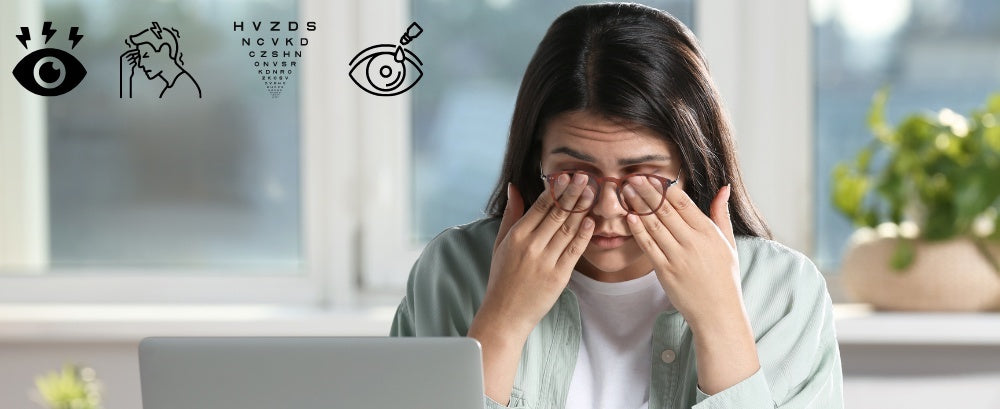 a young woman suffering from eye strain in the office