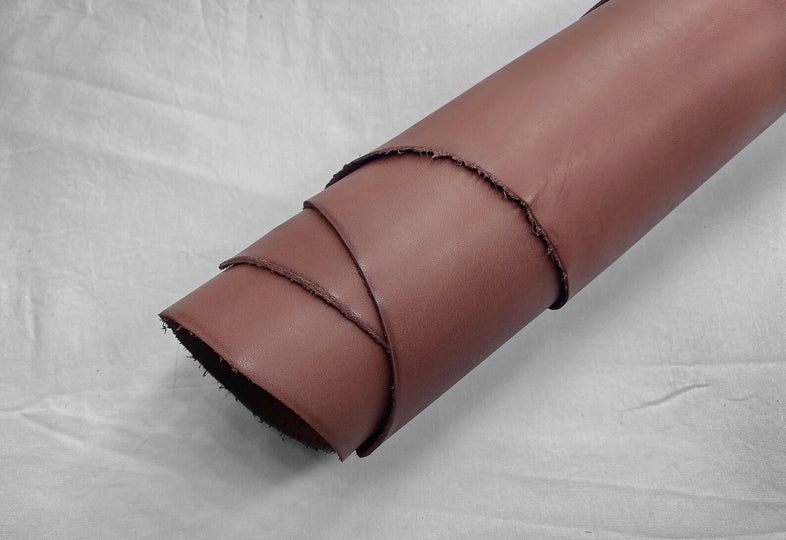 Rolled up sheet of light brown vegan leather