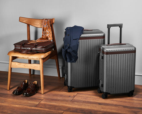 Luggage set, brown briefcase and wooden chair