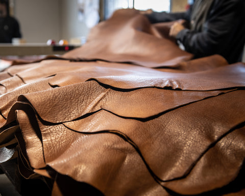 Sheets of stacked brown leather