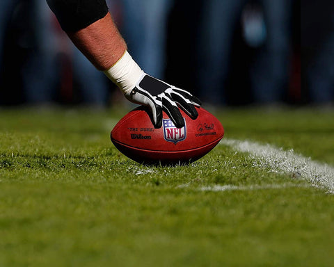 Brown NFL Duke's ball with brown leather imprint