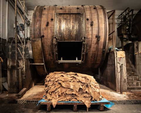 Animal hides stacked on top of one another in a leather tannery