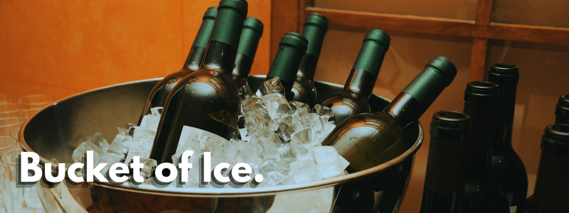 Wine Cooler - Bucket of Ice Filled with Wine