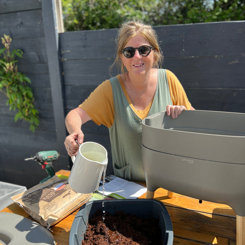 Adding water to the wormery with Helen Round