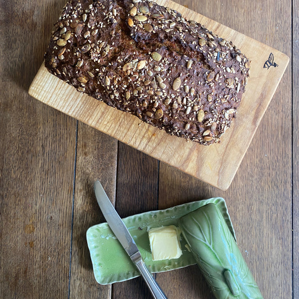 Super Seeded Rye Bread on Bee Bread Board From Helen Round With Green Butter Dish