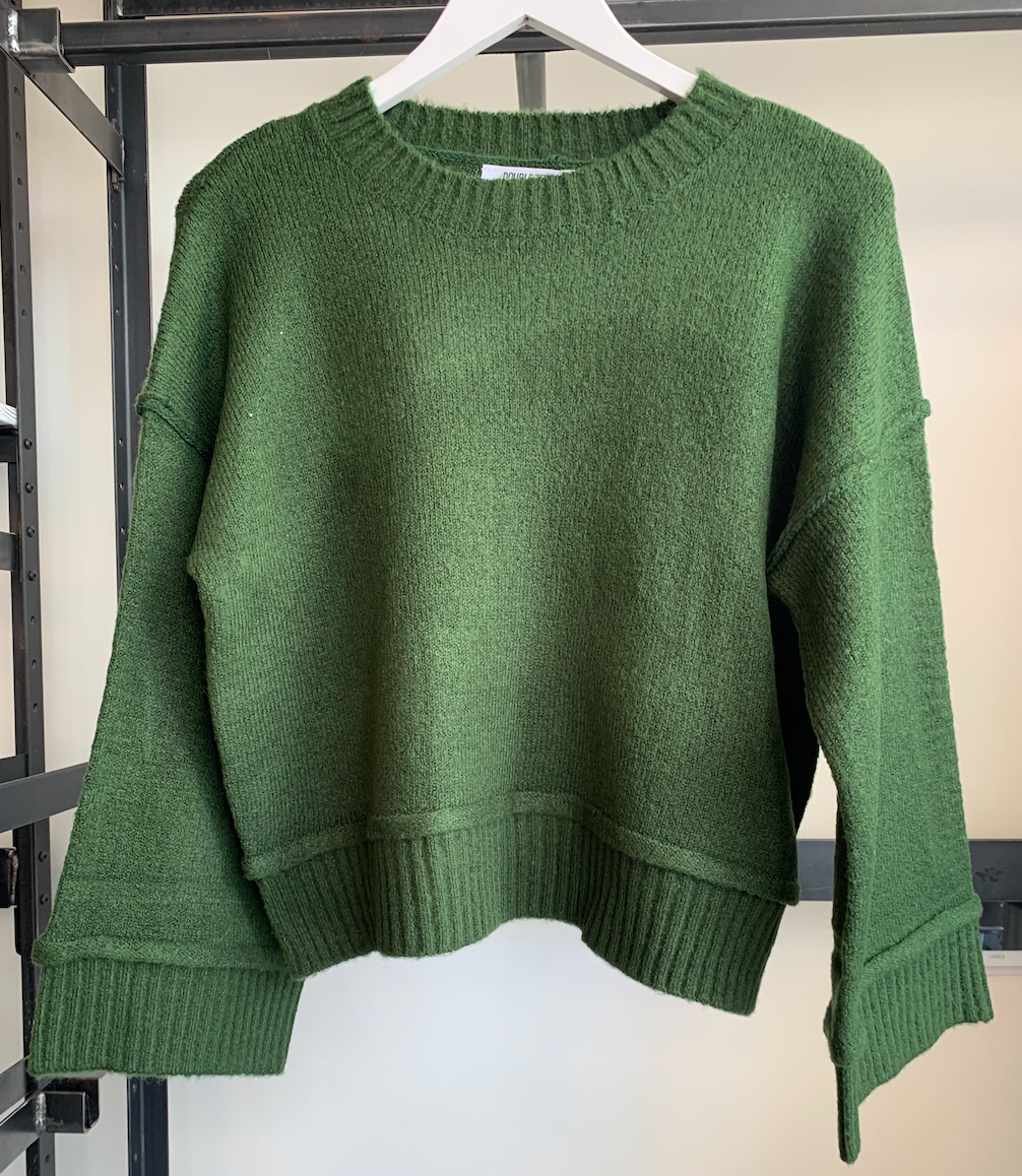 dark green sweater