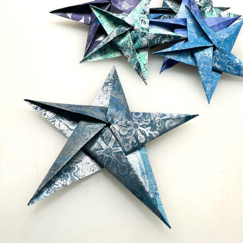 origami stars made out of blue gel printed washi paper