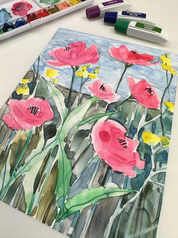 watercolor flowers painting with paint tubes and palette in the background