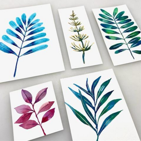 watercolor leaves in shades of blue, green and purple